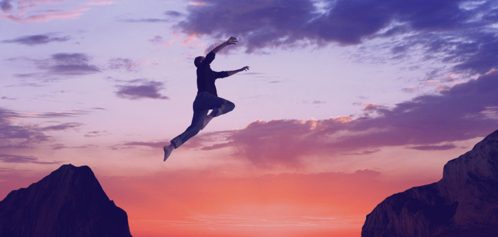 Man Jumping Over Gap